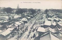 A street in Beijing with Miaoying Temple White Pagoda at the upper left corner