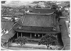 White Pagoda Temple in Fuzhou with a large white pagoda and traditional Chinese architecture under a blue sky