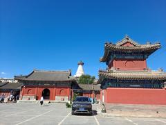 Miaoying Temple in Beijing with traditional Chinese architecture and blue glazed tiles