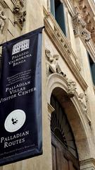 Palladian Villas Visitor Center information banner on Corso Fogazzaro in Vicenza showing Valmarana Palace architecture