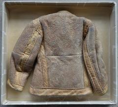 Small rabbit fur jacket miniature labeled Kailis Wilna, from a WWII fur factory in Vilnius, Lithuania