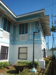 Facade and interior of Baldomero Aguinaldo Shrine with fences and tombs in Kawit, Cavite Philippines