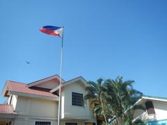 Facade and interior of Baldomero Aguinaldo Shrine museum with fences and tombs in Kawit, Cavite