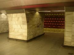 Flora station pillars in Prague Metro with distinctive red and white design
