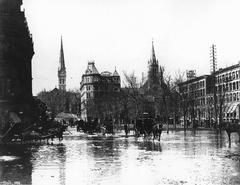 Historic flood in Victoria Square, Montreal, 1886 with submerged streets and buildings