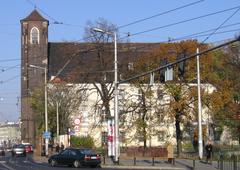 Blessed Virgin Mary Church on Piasek Island in Wrocław, Poland with Piaskowy Bridge and University Library