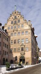 Exterior view of Stadtmuseum Fembohaus in Nürnberg featuring historic architecture