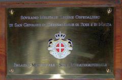 Plaque at the entrance of the Sovereign Military Order of Malta building