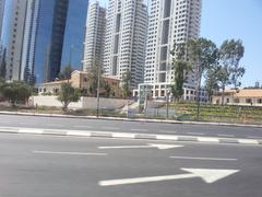 Tel Aviv cityscape with modern buildings and clear blue sky in July 2014