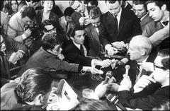 Luis F. Leloir surrounded by journalists after winning the Nobel Prize in Chemistry in 1970