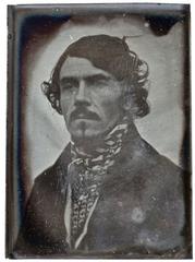 Portrait of Eugène Delacroix by Léon Riesener, 1842, showing the French Romantic artist facing forward in a bust-length depiction.
