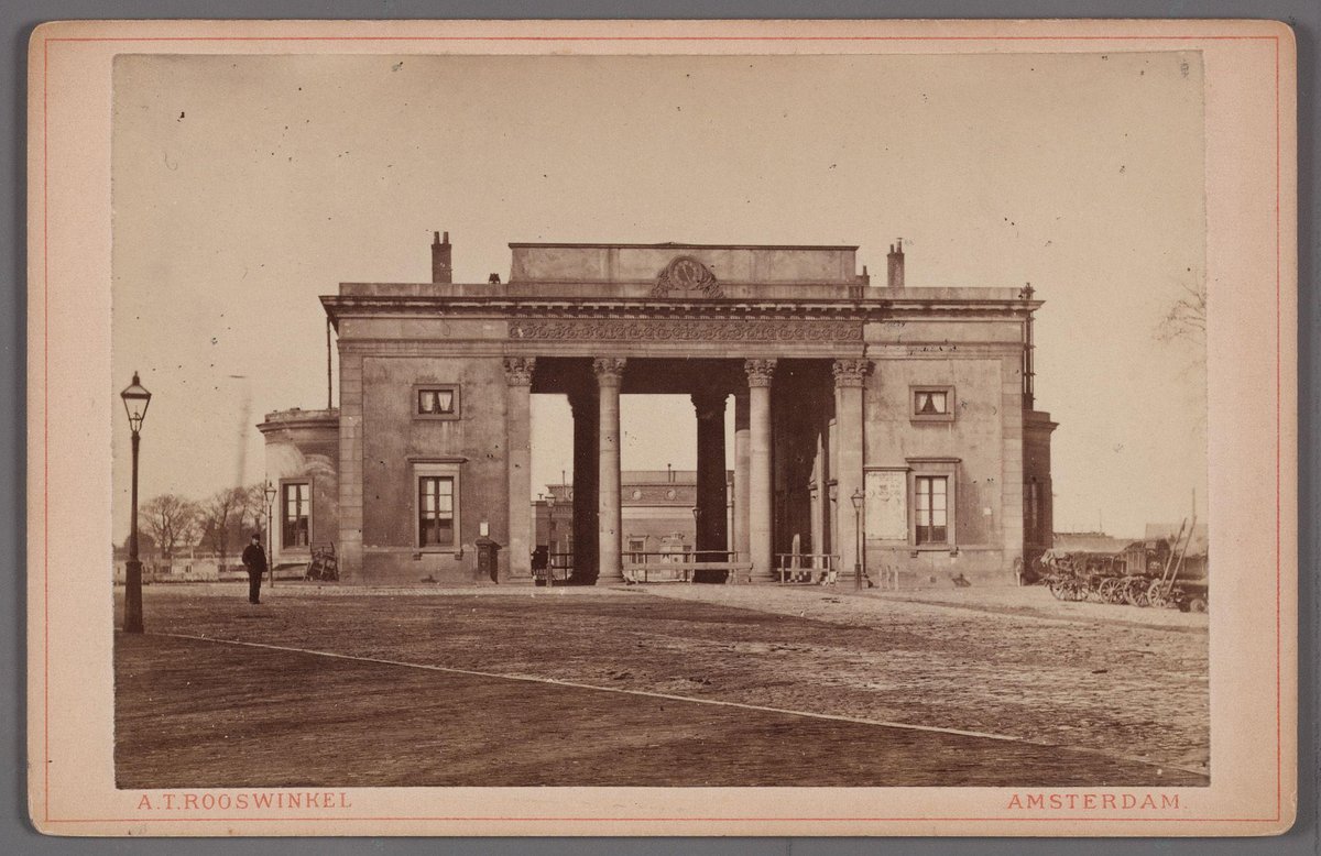 Historic view of Haarlemmerpoort gate at Haarlemmerplein with old Willemspoort station visible behind, Amsterdam, circa 1868