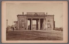 Historic view of Haarlemmerpoort gate at Haarlemmerplein with old Willemspoort station visible behind, Amsterdam, circa 1868