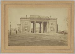 Historical photo of Haarlemmerpoort (Willemspoort) at Haarlemmerplein 50 in Amsterdam around 1868 with partially visible Station Willemspoort of the Hollandsche IJzeren Spoorweg Maatschappij