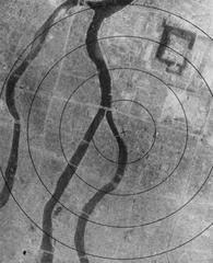 Aerial view of Hiroshima after atomic bombing showing destruction and circular impact zones