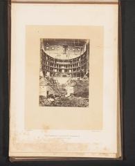 Interior view of the Théâtre de la Ville in Paris after the fire caused by the Paris Commune, showing the ruined theater hall