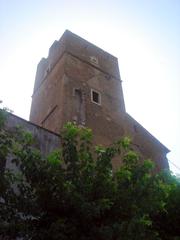 Fortified convent tower of Santa Balbina under blue sky