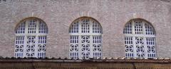Santa Balbina church facade with large windows
