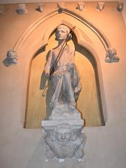 Rebec player statue at Musée Saint Rémi in Reims