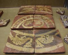 Rustic terracotta floor tiles at Musée Saint Rémi in Reims
