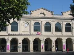 Exterior view of Gare de Nîmes railway station with modern architectural design