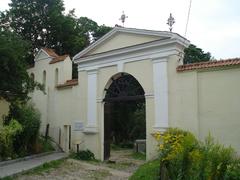 Historic Bernardine Cemetery with old gravestones and lush green trees