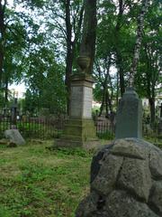 Bernardine Cemetery with old tombstones and leafless trees on a cloudy day