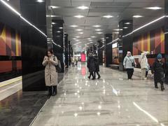 Kornilovskaya Moscow Metro Station interior with blue and white tile design and escalators