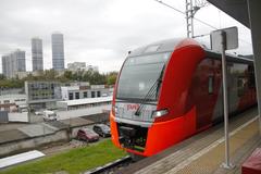 Rostokino MCC station platform with ES2G-031 train arriving