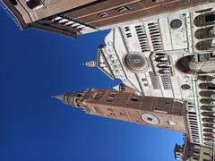 Daytime view of the facade of Cremona Cathedral and Torrazzo tower