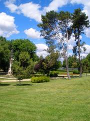 Scenic view of Parque del Oeste in Madrid with lush greenery and walking paths