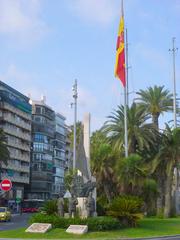 Alicante city square Plaza Puerta del Mar with fountain and surrounding palm trees