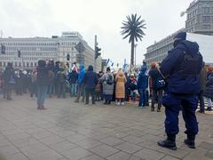 Pro-Israeli protest in Warsaw with supporters holding Israeli flags and placards