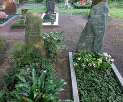 Gravestones of Henning 'Henner' Berzau and Heribert A. Hilgers at Cologne South Cemetery