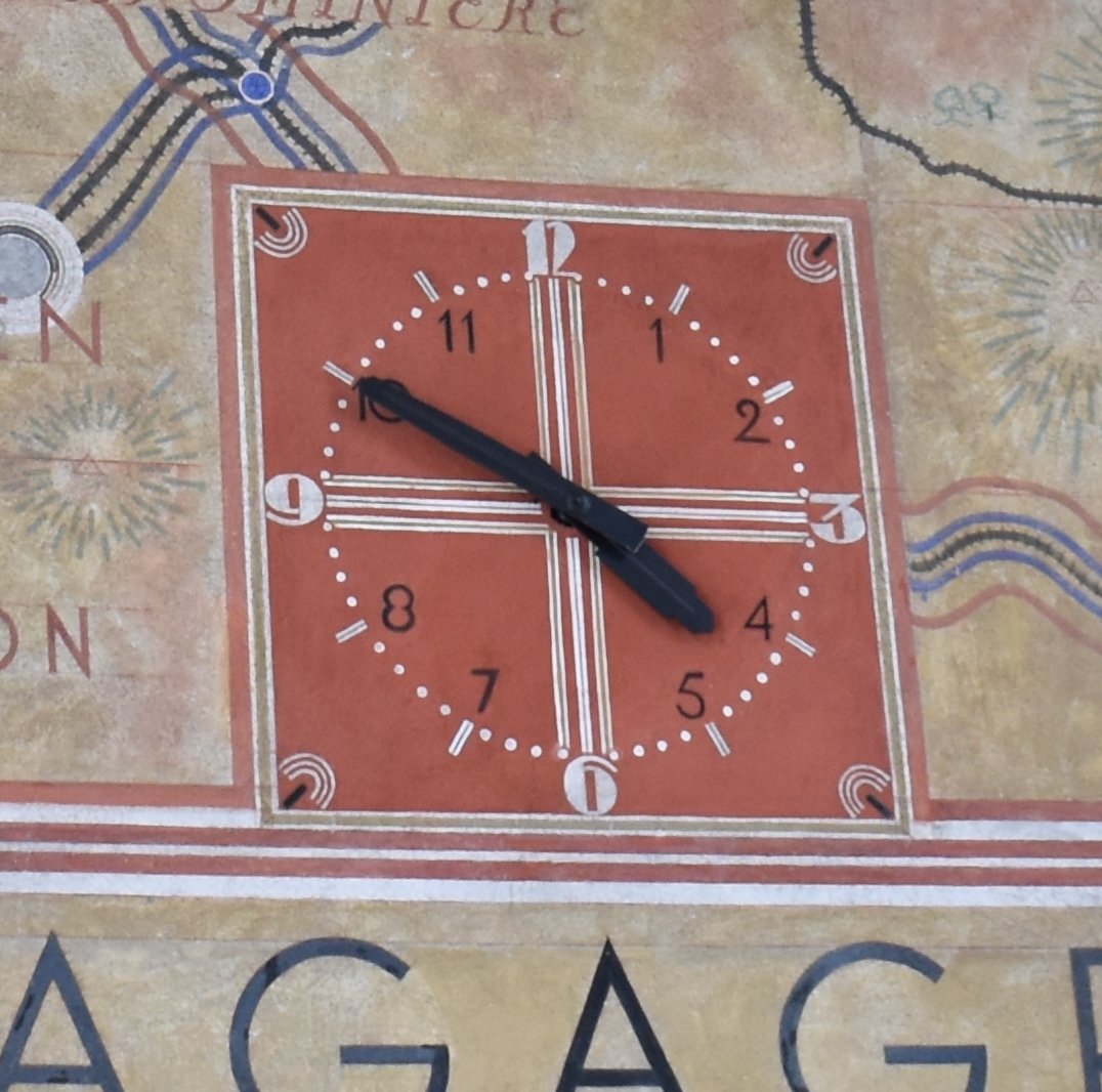 Interior clock at Gare de Dinan train station