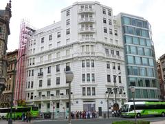 Plaza de Federico Moyúa in Bilbao with surrounding buildings and cars