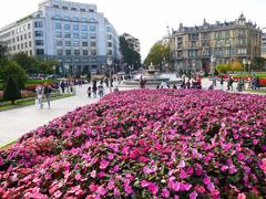Plaza de Federico Moyúa in Bilbao with buildings and green park area