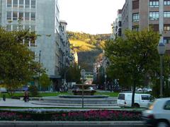 Moyua Square in Bilbao with modern buildings and green spaces
