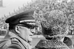 General George H. Decker sitting in the stands at the Army-Navy Football Game in Municipal Stadium, Philadelphia