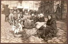 Vilnius woman selling Easter palms near All Saints Church on Rūdninkų street, 1916