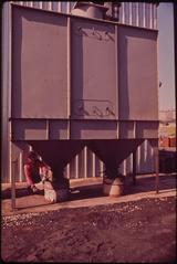 Exterior of a large enclosed sandblasting unit at Avondale Shipyard