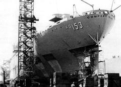 Stern of the U.S. Navy auxiliary USS Compass Island (AG-153) in drydock at Avondale Shipyard, New Orleans, 1977