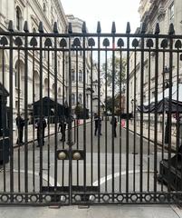 View of Downing Street through gates in September 2023