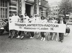 Black and white photo of Academisch Ziekenhuis Leiden on Stadhuisplein with director of Eurotransplant Dr. G. Persijn in 1988