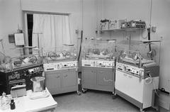 Four incubators in a nursery room with premature quadruplets in Leiden, Netherlands, 1974