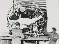 black and white photo of academic hospital Leiden patient being moved on shock-free stretcher from old to new building 1985