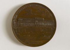 1770 medal depicting construction of Paris Mint building with laurel-crowned Louis XV head and façade on the Seine river