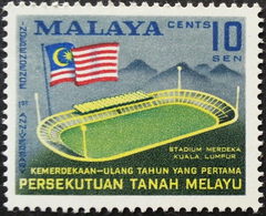 10 sen stamp featuring Merdeka Stadium and waving Malaysian flag in Kuala Lumpur