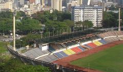 Stadium Merdeka in Kuala Lumpur with comprehensive stands under a clear sky