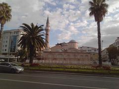 Fenari Isa Mosque in Istanbul with intricate architecture under blue sky